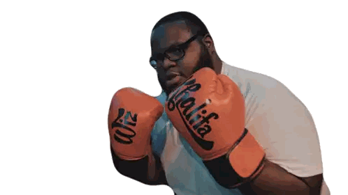Man Wearing Orange Boxing Gloves Qualita Sticker