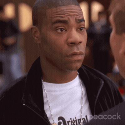 Man Wearing Original Peacock Necklace GIF
