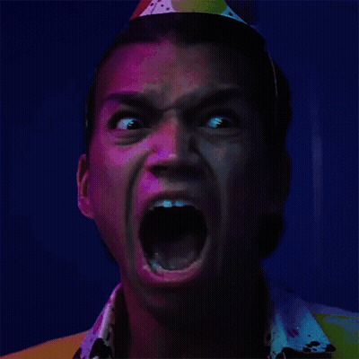 Man Wearing Party Hat With Open Mouth GIF