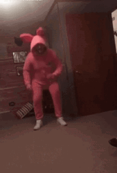 Man Wearing Pink Bunny Costume Hopping GIF