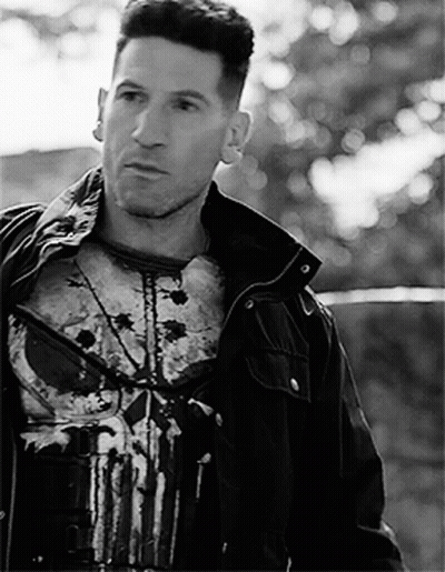 Man Wearing Punisher T-Shirt And Jacket GIF