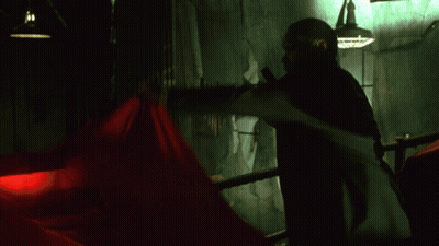 Man Wearing Puppet Mask With Red Bow Tie GIF