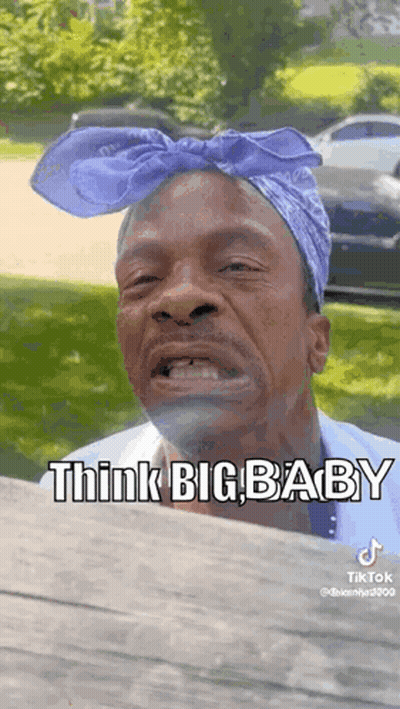 Man Wearing Purple Bandana Making Funny Face GIF