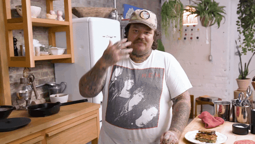 Man Wearing R.E.A. T-Shirt GIF