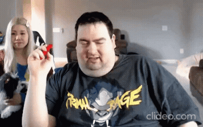 Man Wearing Raw Rage Shirt GIF