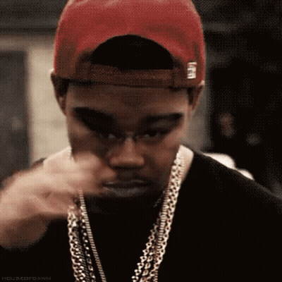 Man Wearing Red Hat And Chains Making Face GIF
