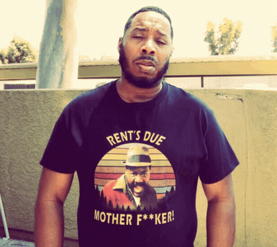 Man Wearing Rent Due T-Shirt GIF