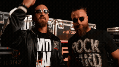 Man Wearing Rock Hard Shirt GIF
