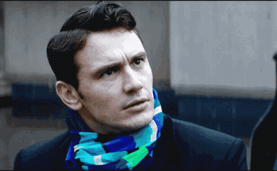 Man Wearing Scarf Looking Left GIF