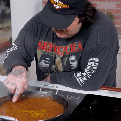Man Wearing Sepultura Shirt Stirring Pot GIF