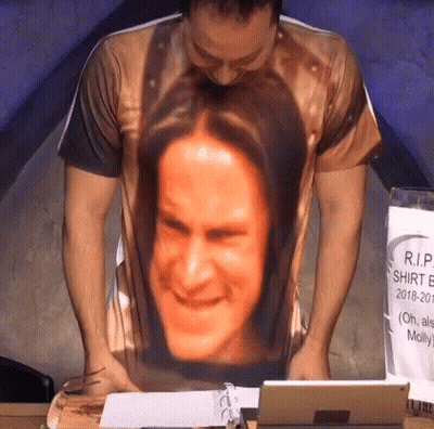 Man Wearing Shirt With Face Picture GIF