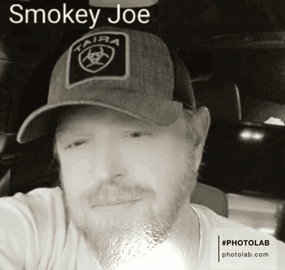 Man Wearing Smokey Joe Hat GIF