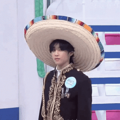 Man Wearing Sombrero And Badge GIF