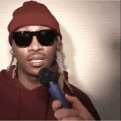 Man Wearing Sunglasses And Beanie Holding Microphone GIF