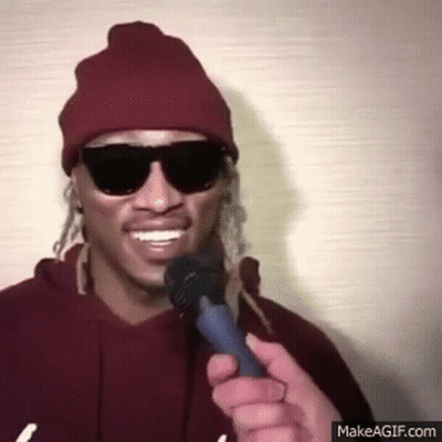 Man Wearing Sunglasses And Beanie Holding Microphone GIF