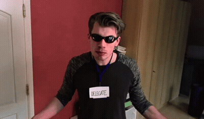 Man Wearing Sunglasses And Name Tag GIF