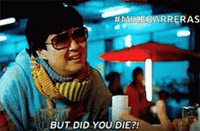 Man Wearing Sunglasses And Scarf Talking GIF
