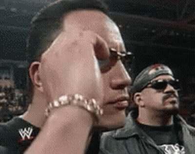 Man Wearing Sunglasses And W Bracelet GIF