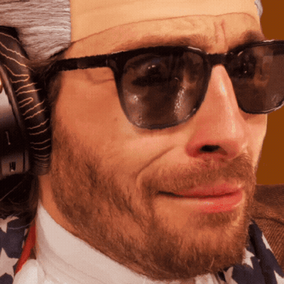 Man Wearing Sunglasses And Wig With H GIF