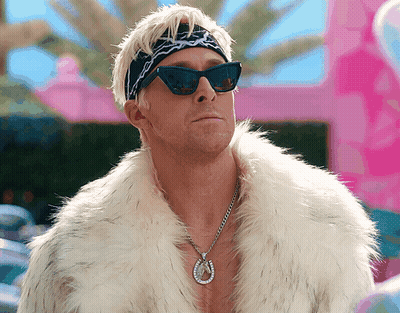 Man Wearing Sunglasses Fur Coat And Horseshoe Necklace GIF