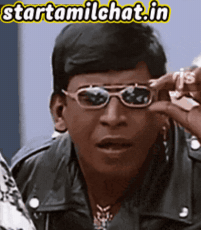 Man Wearing Sunglasses Holding Dollar Sign GIF