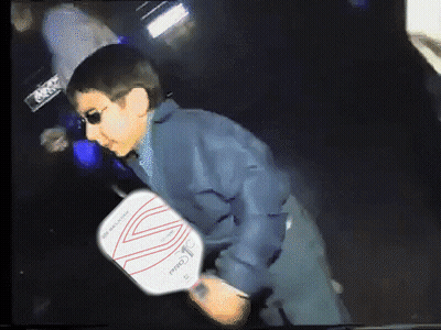 Man Wearing Sunglasses Holding Pro Paddle GIF