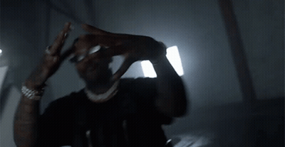 Man Wearing Sunglasses In Dark Room GIF