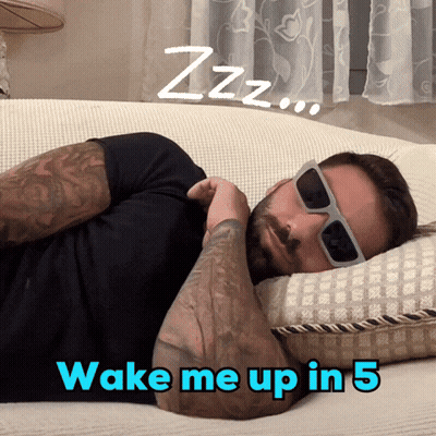 Man Wearing Sunglasses Lying On Couch Wake Me Up In 5 GIF