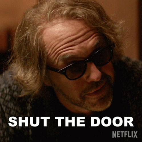 Man Wearing Sunglasses Shut The Door GIF