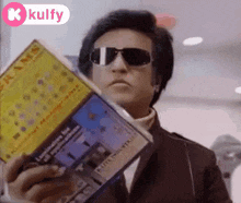 Man Wearing Sunglasses Swaying Book Reading GIF