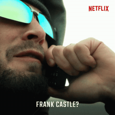 Man Wearing Sunglasses Talking On Phone GIF