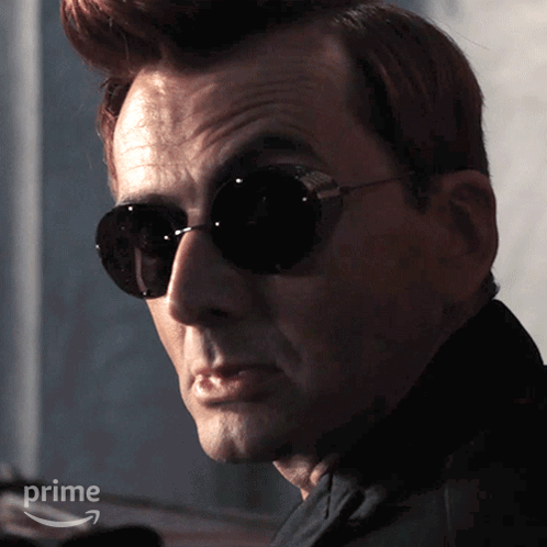 Man Wearing Sunglasses With Prime Logo GIF