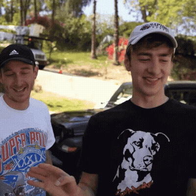 Man Wearing Super Bowl XXII Shirt Next To Another Man GIF