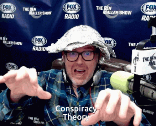 Man Wearing Tin Foil Hat With Conspiracy Theory GIF