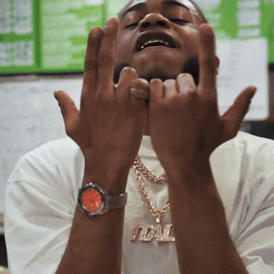Man Wearing Watch And Necklace Saying TML GIF