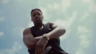 Man Wearing Watch In Cloudy Sky GIF