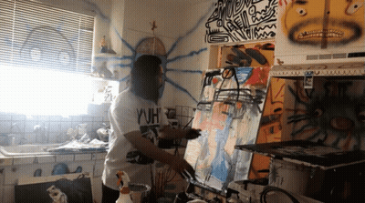 Man Wearing WH Shirt Painting On Canvas GIF