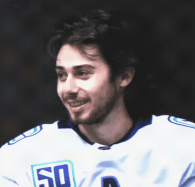 Man Wearing White Jersey Number 50 GIF