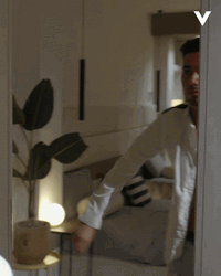 Man Wearing White Polo Getting Ready GIF