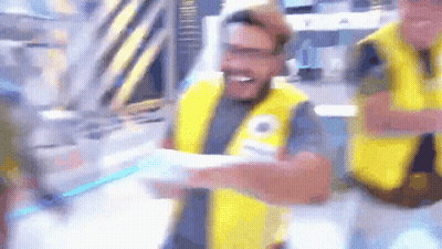 Man Wearing Yellow Vest With Letter O GIF