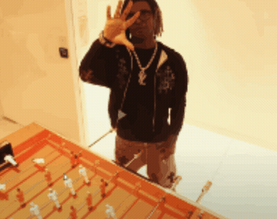 Man Wearing Yves Saint Laurent Necklace Making Peace Sign GIF