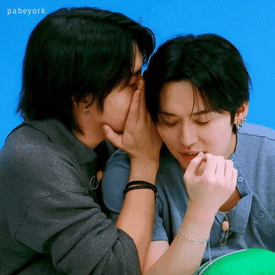 Man Whispering Into Another Man's Ear GIF