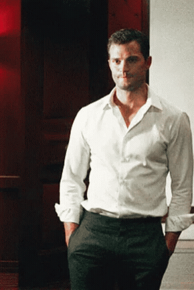 Man White Shirt Black Pants Hands In Pockets GIF