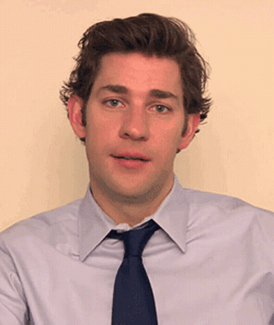 Man White Shirt Blue Tie Looking At Camera GIF