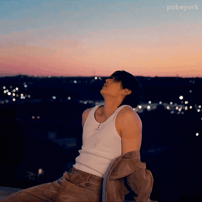 Man White Tank Top Brown Pants Skygazing GIF