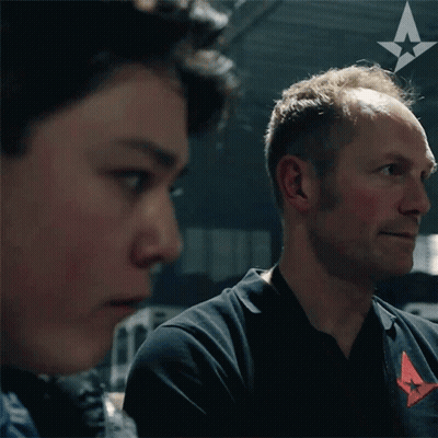 Man With A On Ear Looking At Another GIF