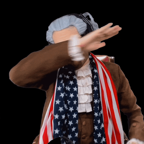 Man With American Flag Draped Around Neck Doing Dab GIF