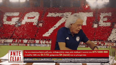 Man With Ante Teia Sign In Front Of Crowd GIF