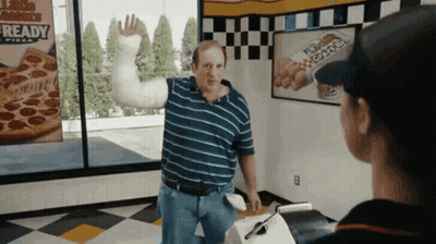 Man With Arm Cast In Front Of Ready Sign GIF
