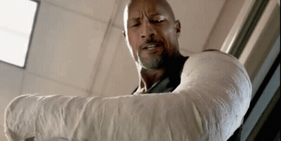 Man With Arm Cast Standing By Window GIF